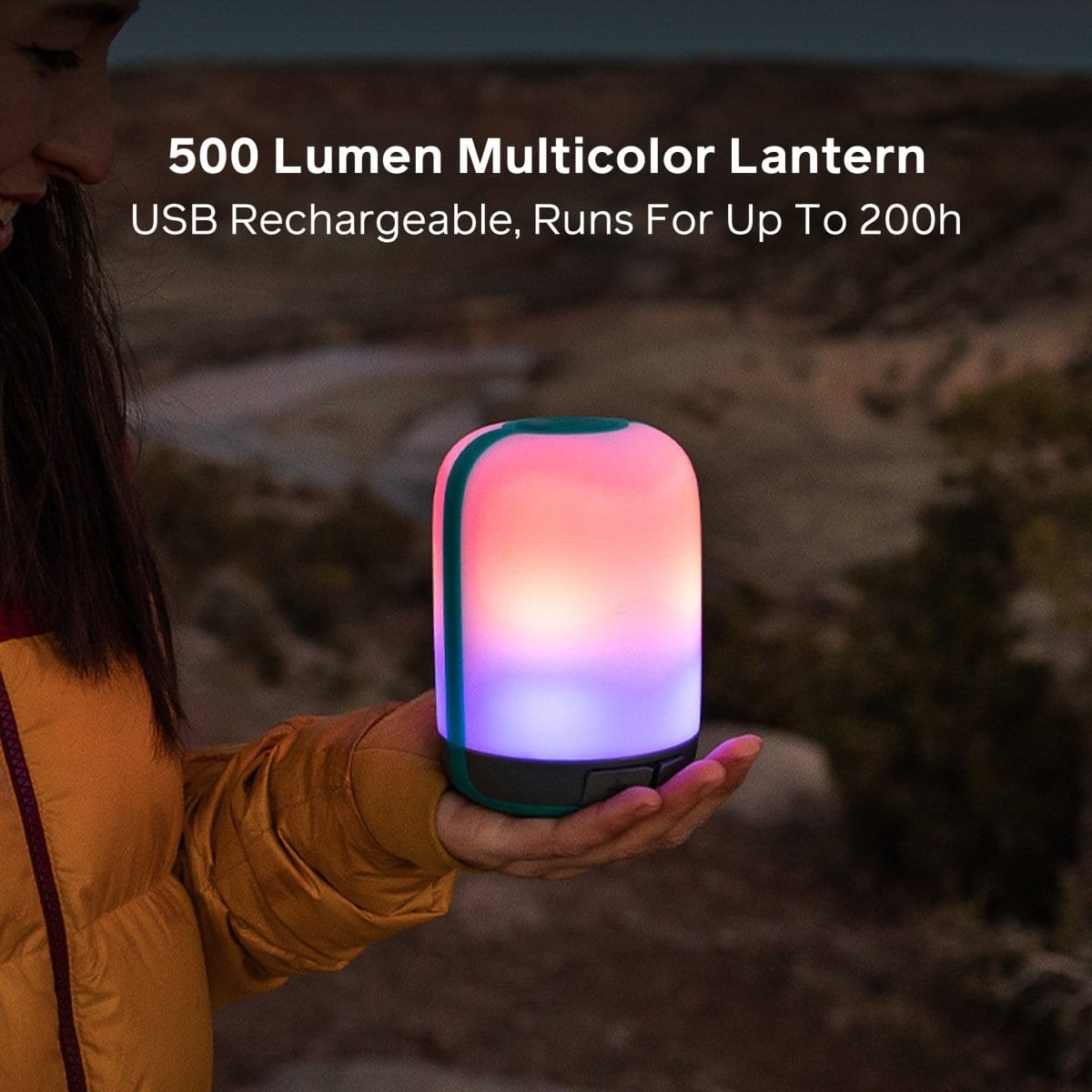 BioLite AlpenGlow 500 glowing in a soft color mode at camp
